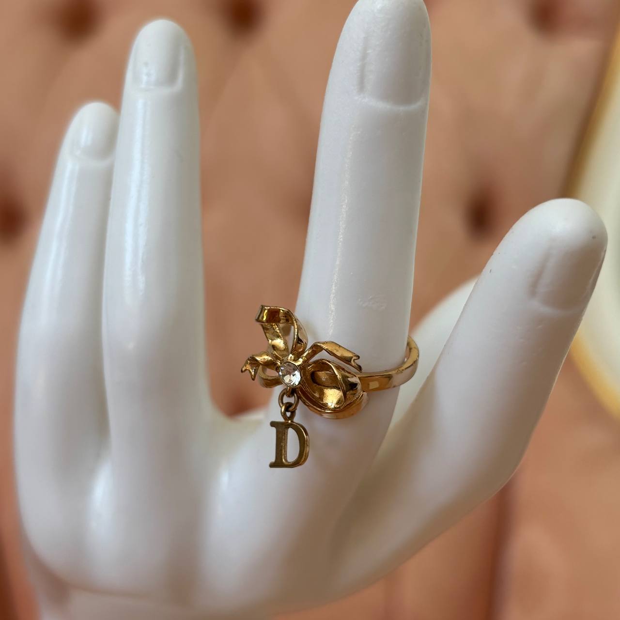 Christian Dior ring golden bow CD