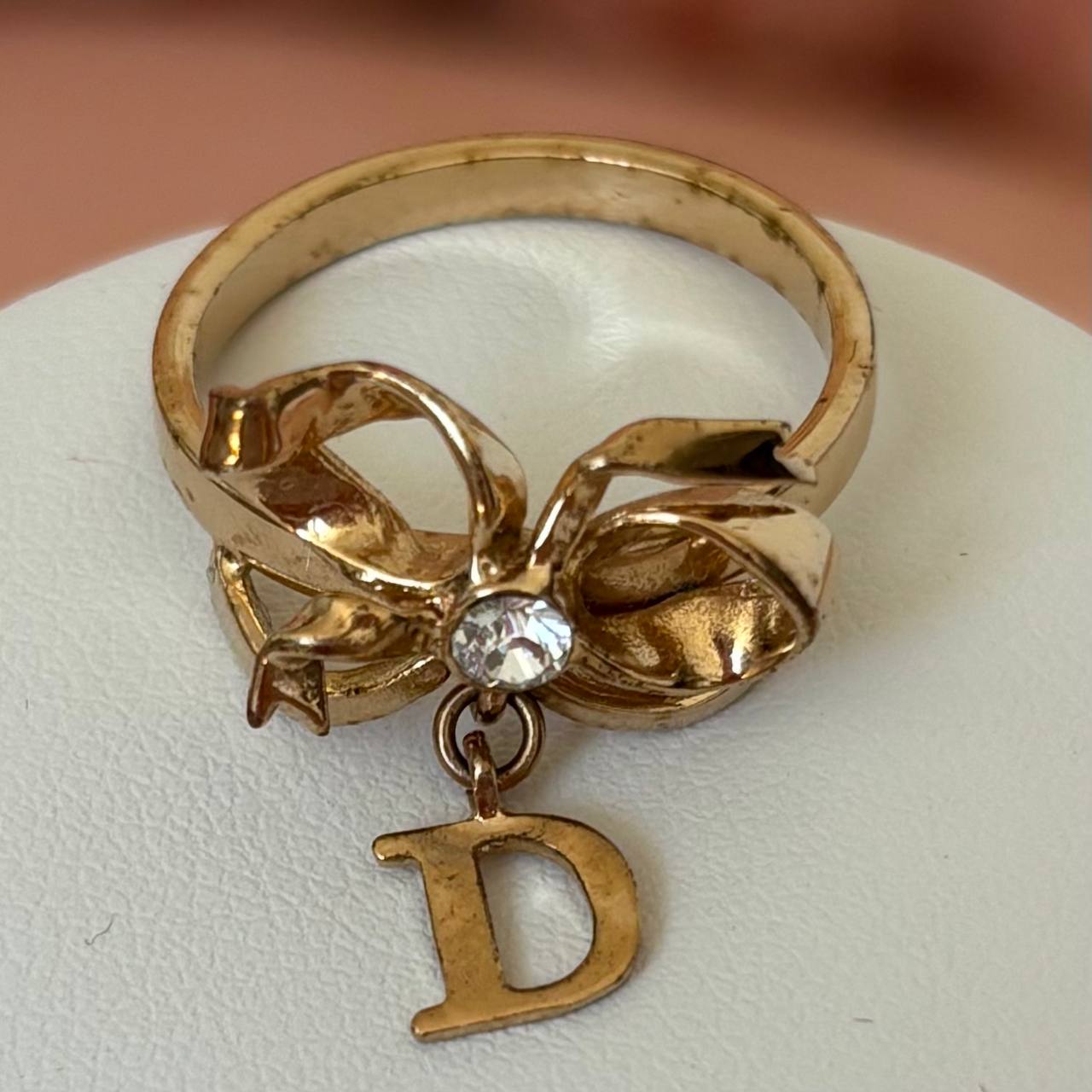 Christian Dior ring golden bow CD