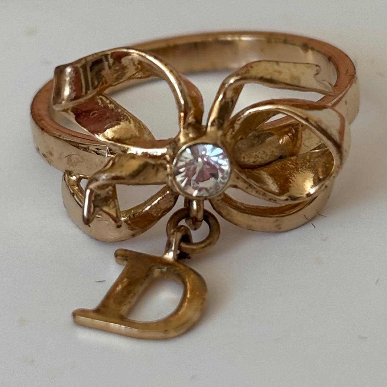 Christian Dior ring golden bow CD