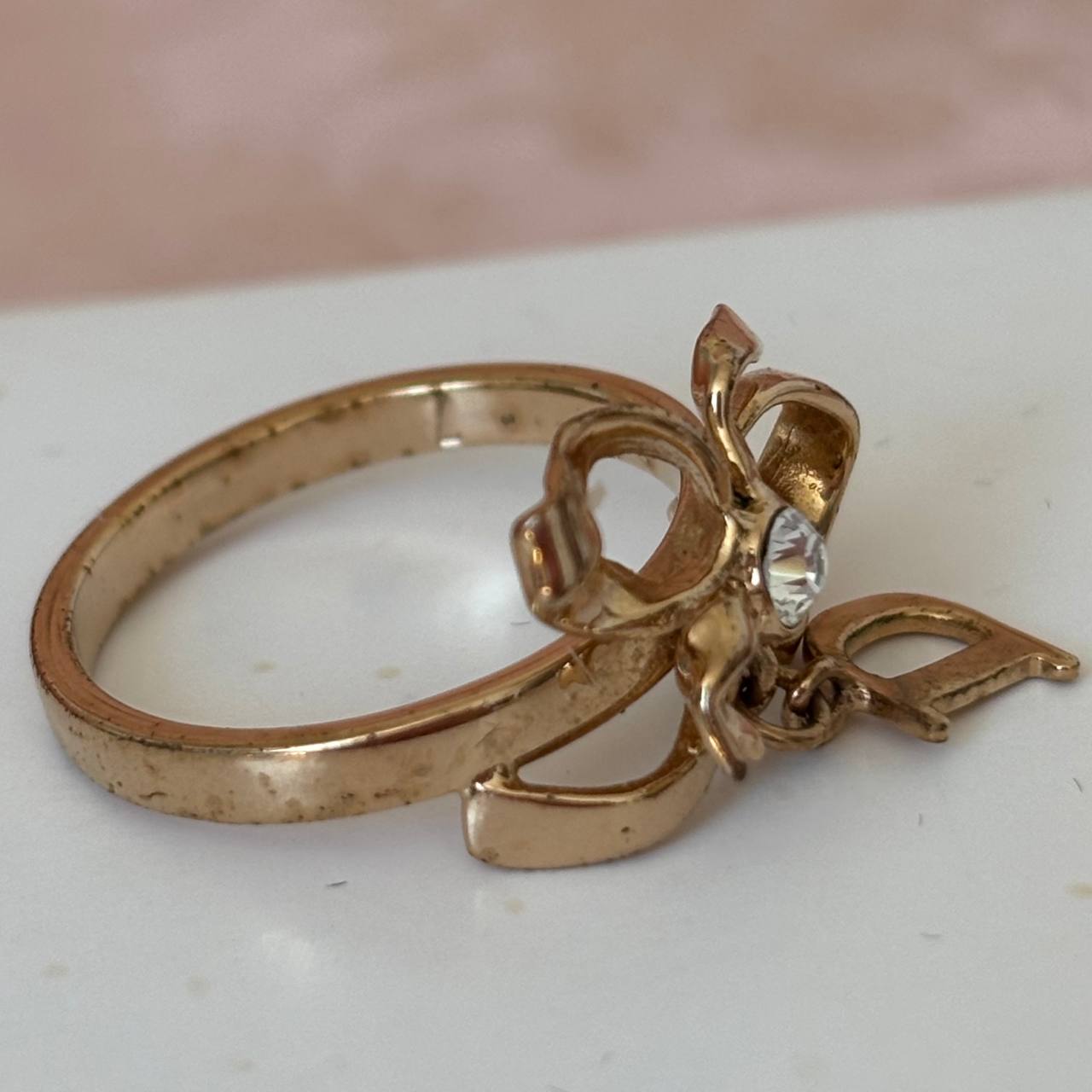 Christian Dior ring golden bow CD