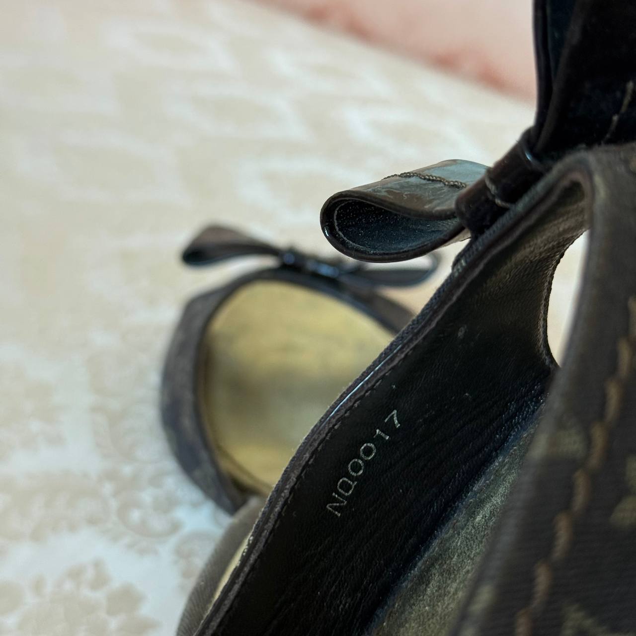 Louis Vuitton monogram mules in chocolate brown