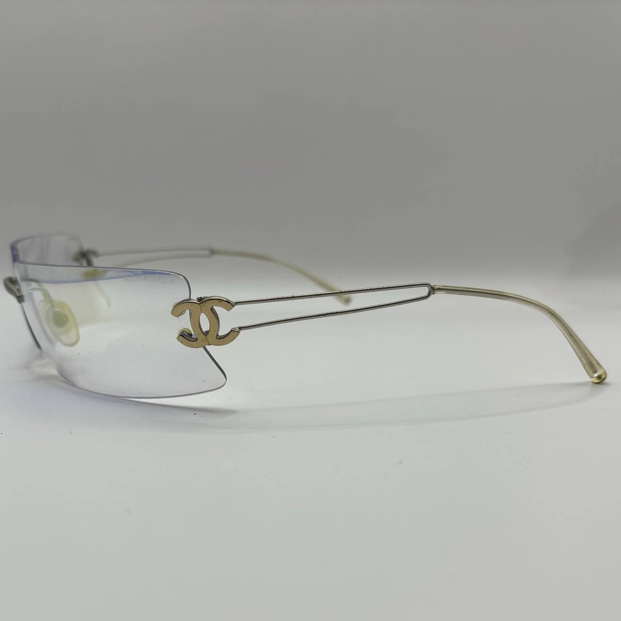 Chanel sunglasses vintage rimless frameless CC chameleon transparent blue glasses y2k with logo