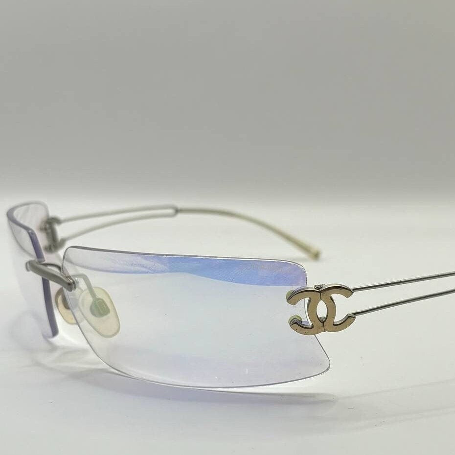 Chanel sunglasses vintage rimless frameless CC chameleon transparent blue glasses y2k with logo