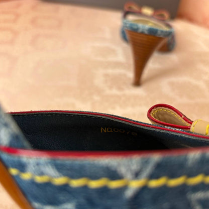 Louis Vuitton mules heels