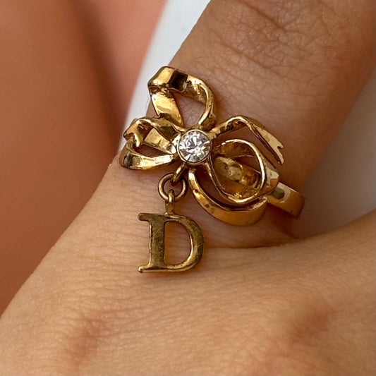 Christian Dior ring golden bow CD