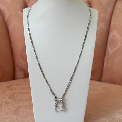 Christian Dior necklace silver bow