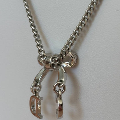 Christian Dior necklace silver bow