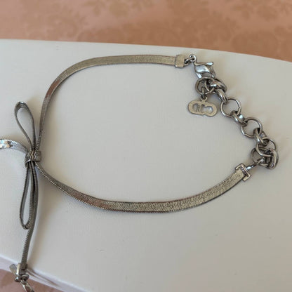 Christian Dior bracelet silver bow