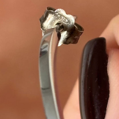 Dolce Gabbana hoop earrings with black crosses