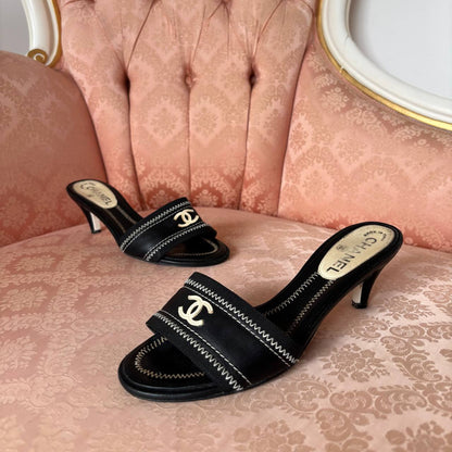 Chanel mules with interlocking CC logo