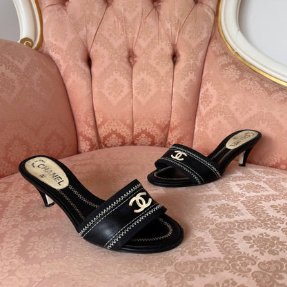 Chanel mules with interlocking CC logo