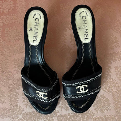 Chanel mules with interlocking CC logo
