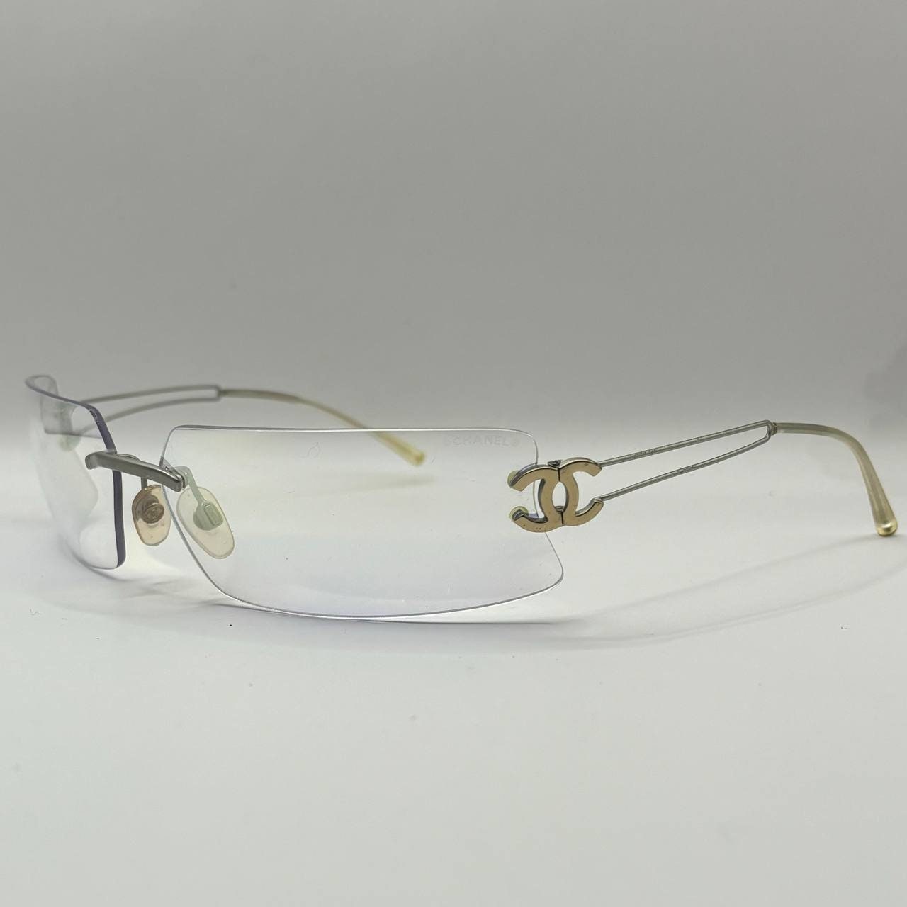 Chanel sunglasses vintage rimless frameless CC chameleon transparent blue glasses y2k with logo