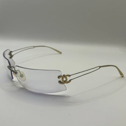 Chanel sunglasses vintage rimless frameless CC chameleon transparent blue glasses y2k with logo