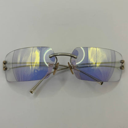 Chanel sunglasses vintage rimless frameless CC chameleon transparent blue glasses y2k with logo