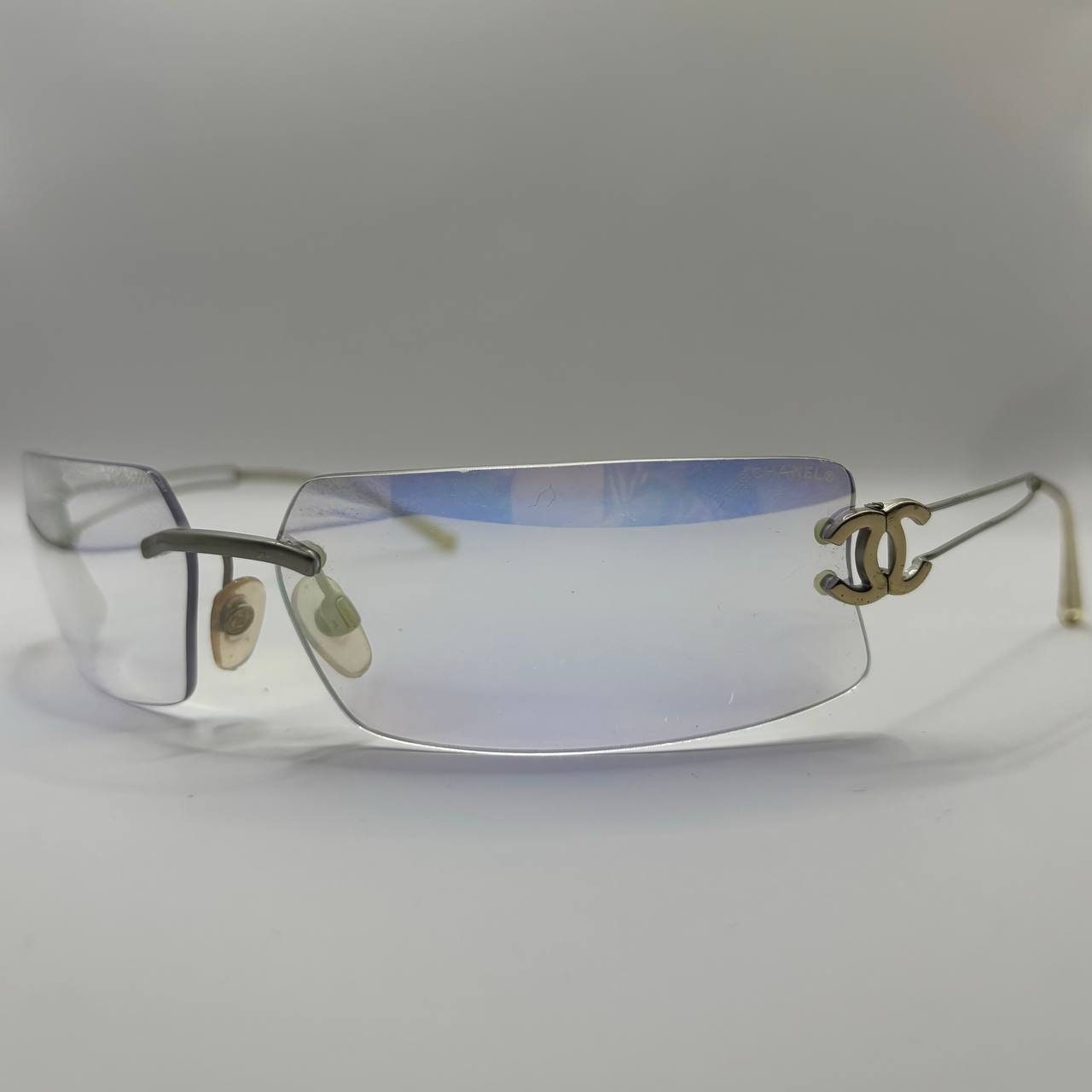 Chanel sunglasses vintage rimless frameless CC chameleon transparent blue glasses y2k with logo