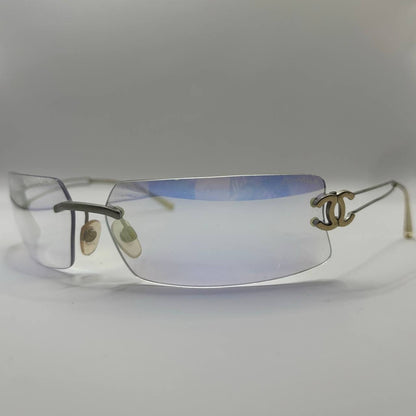 Chanel sunglasses vintage rimless frameless CC chameleon transparent blue glasses y2k with logo