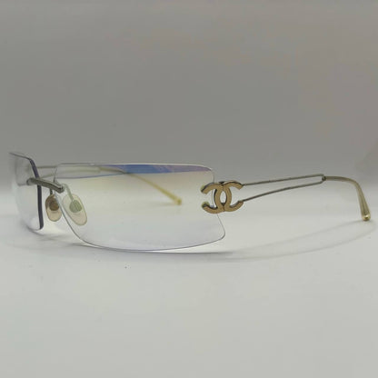 Chanel sunglasses vintage rimless frameless CC chameleon transparent blue glasses y2k with logo